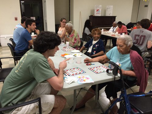 Students volunteer at Spellman House, a home for the Elderly